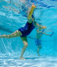 people exercising in pool